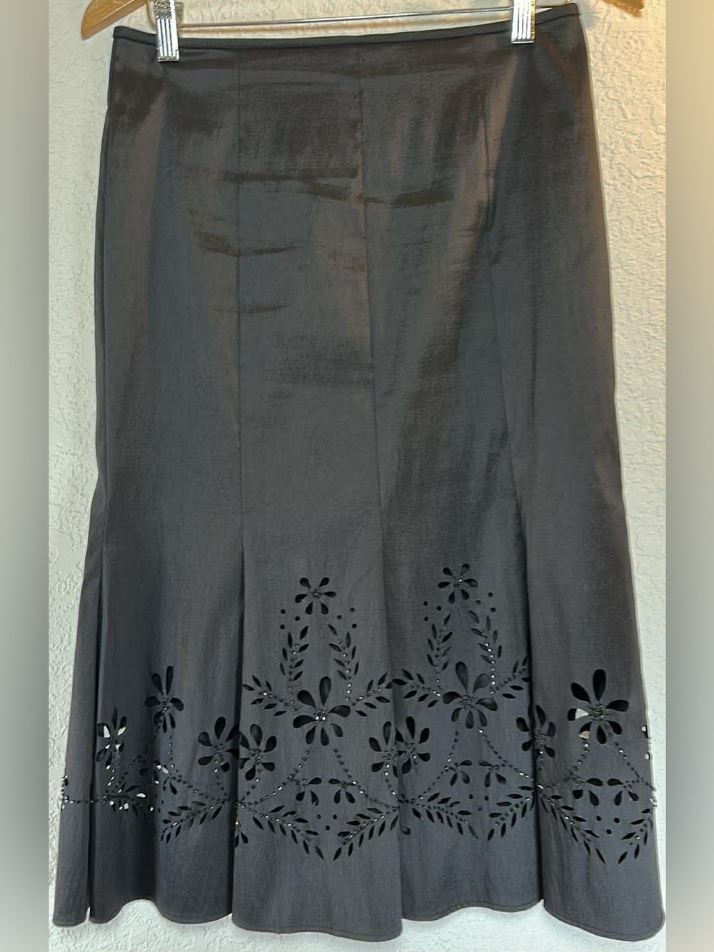 Elegant Black Skirt with Laser-Cut Floral Hem